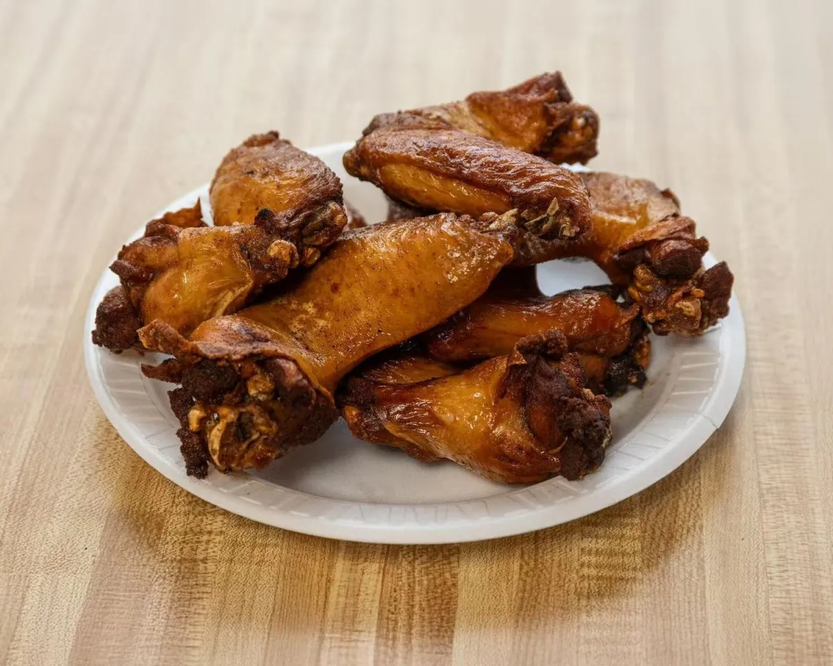 Crispy fried chicken wings with savory seasoning at Wah Sang Restaurant, a Chinese Restaurant in Methuen