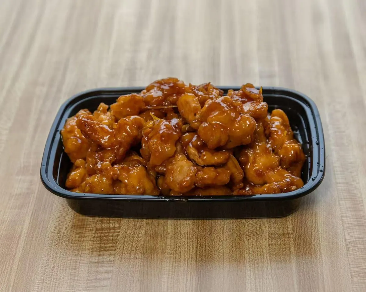 Crispy chicken coated in sweet orange sauce at Wah Sang Restaurant, a Chinese Restaurant in Methuen
